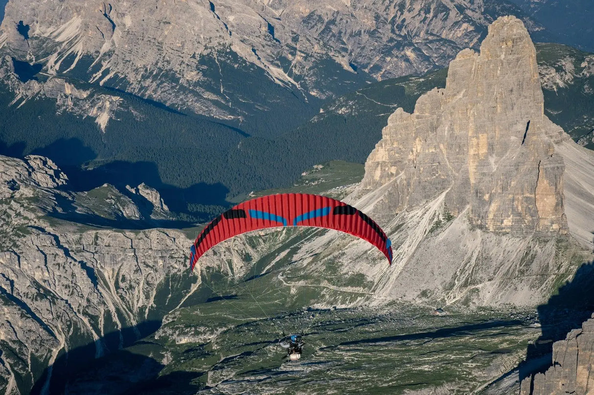 paragliding through mountains
