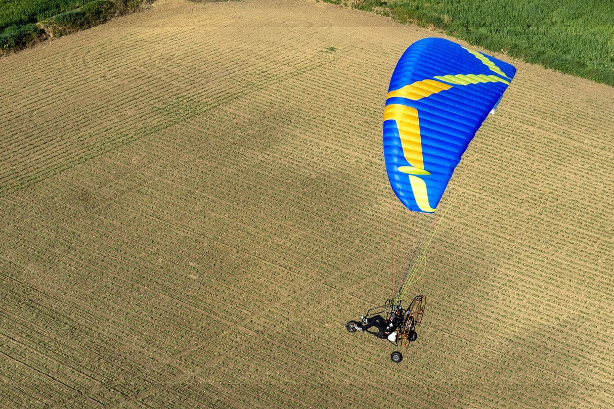 roadmax paragliding trike over a field