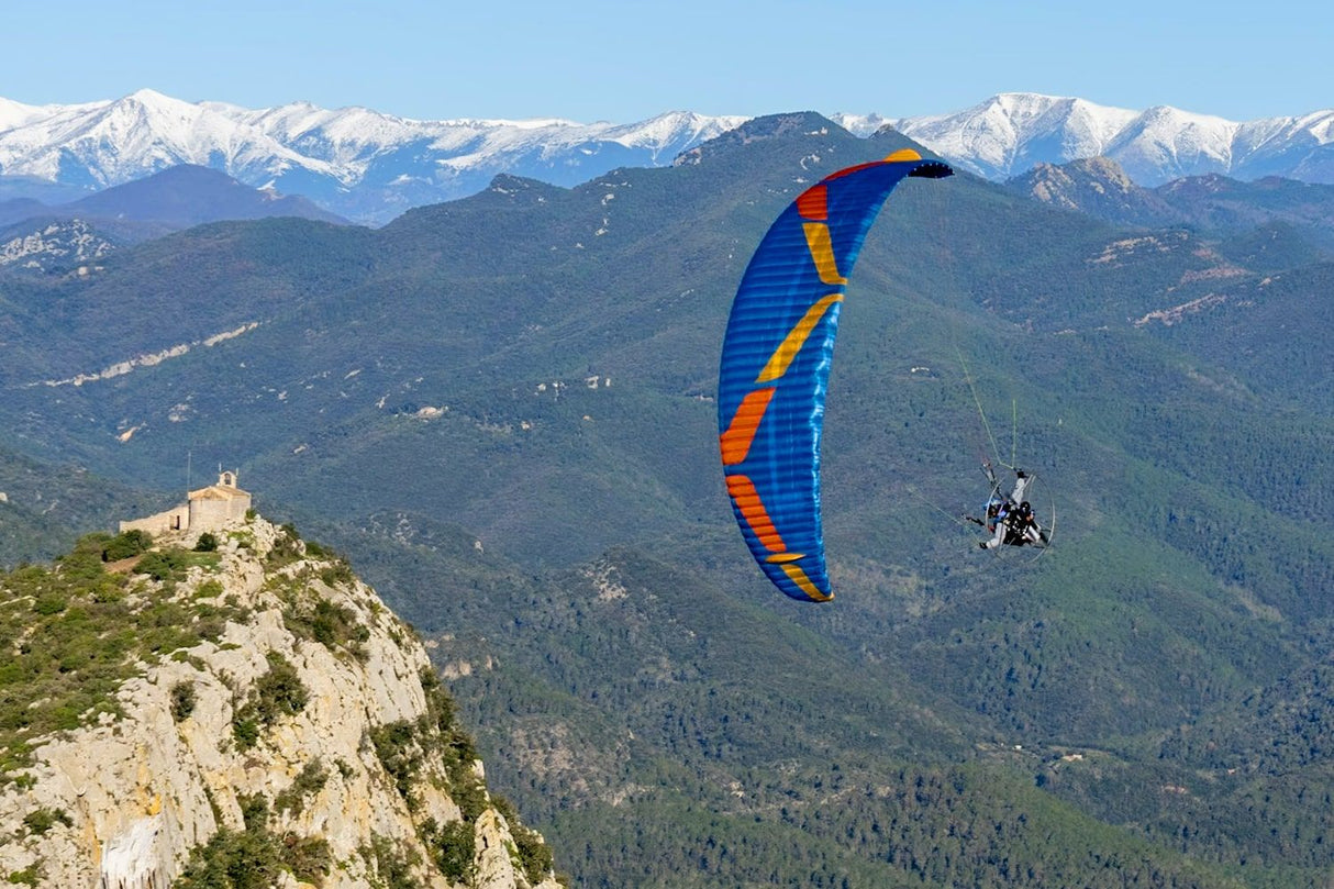 person flying paramotor in the mountains with Viper63