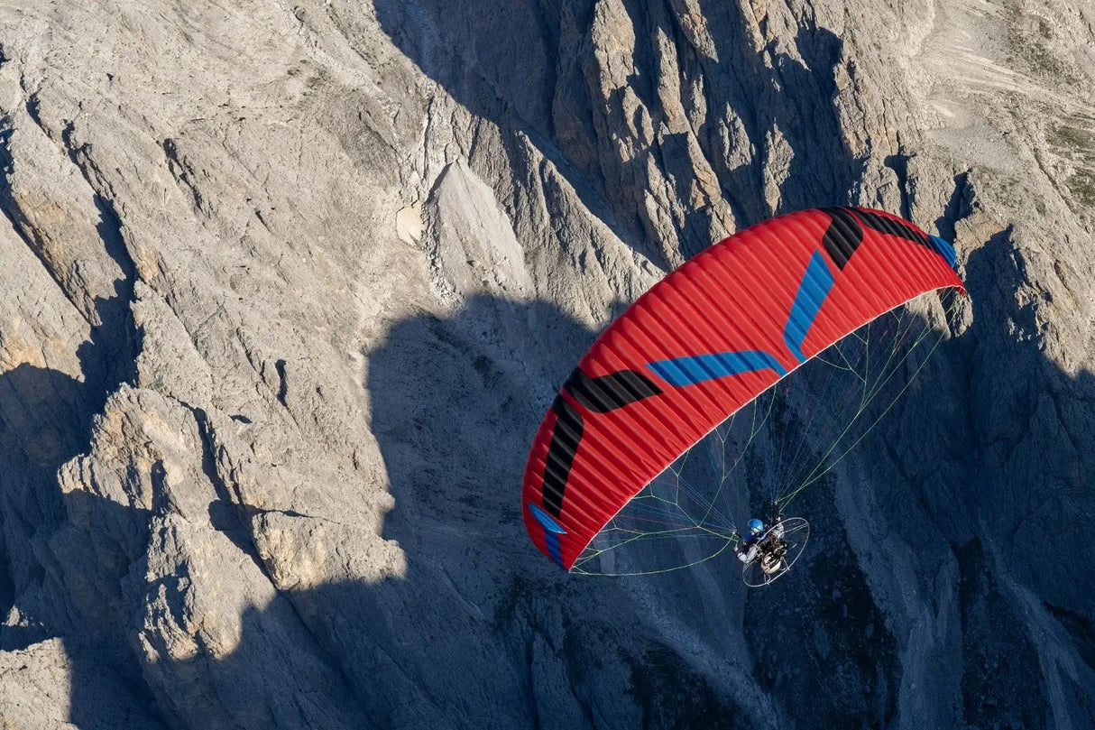 aerial view of paramotor over a mountain