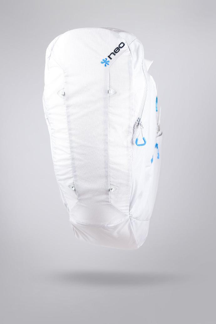 White backpack with blue branding on a gray background
