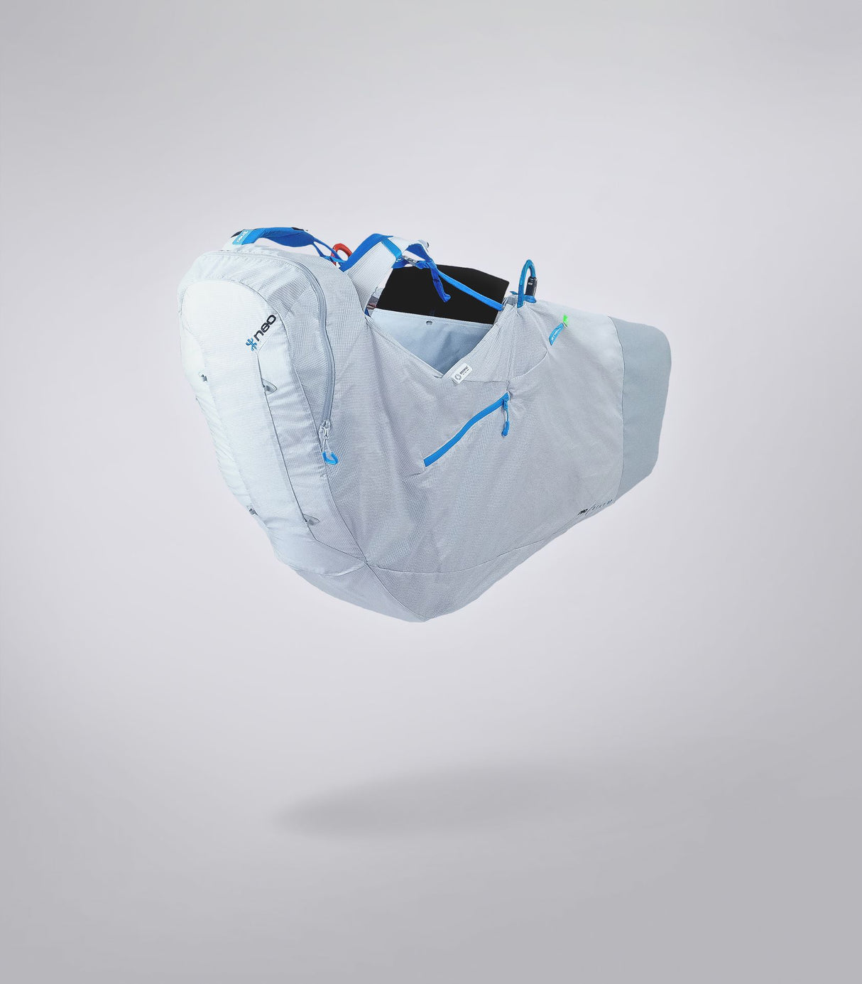 Light blue hand gliding harness pack with blue accents on a gray background