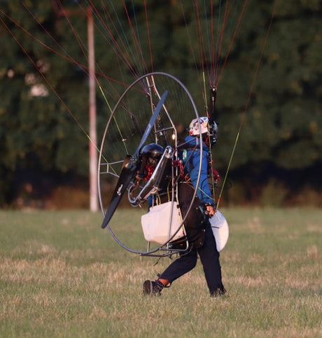 man landing with paramotor