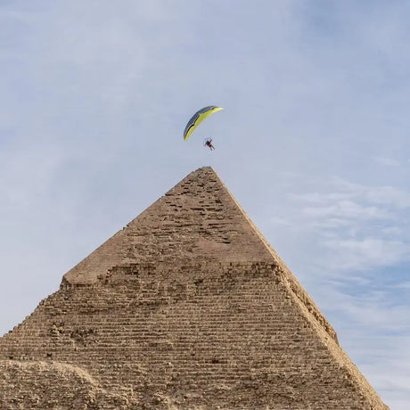 parmamoting over pyramids in egypt
