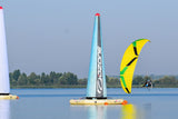 parajet flying around water obstacles