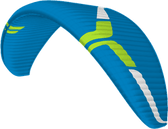 Blue and green paragliding paramotor wing on a white background