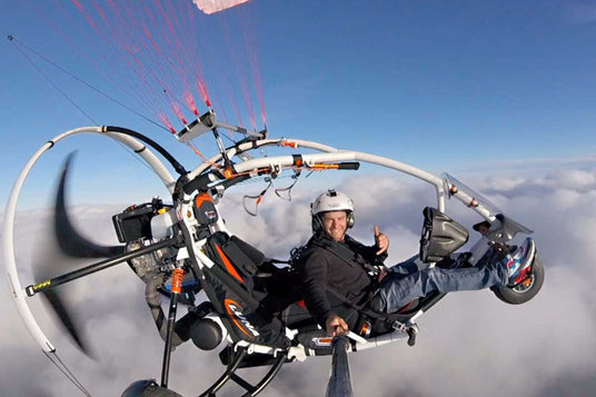 paratrike flying in clouds