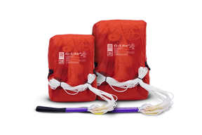 Two red G-Lite fire starters with a purple and black fire starter on a white background
