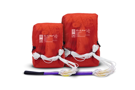 Two red G-Lite fire starters with a purple and black fire starter on a white background