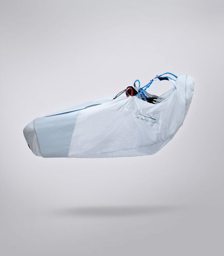 a hand gliding harness in white
