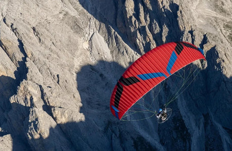 paragliding over a mountain