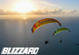 two paramotors flying over the sea